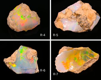May include: Four rough opal stones with iridescent colors, labeled R-4, R-5, R-6, and R-7.