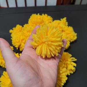 yellow 2 inch fleece pom poms for crafting for crotchet for knitting