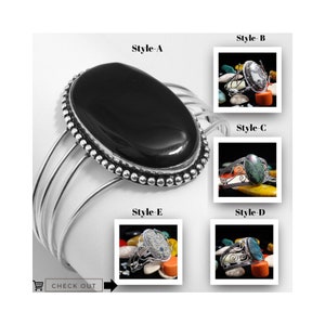May include: A silver cuff bracelet featuring a large, oval black stone. The bracelet has a beaded border and multiple parallel bands. Additional images show various ring styles with different stone colours and designs. The text "CHECK OUT" is visible.
