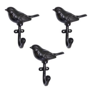May include: Three black cast iron bird hooks. Each hook features a detailed bird design with a curved hook extending from the bird's body.