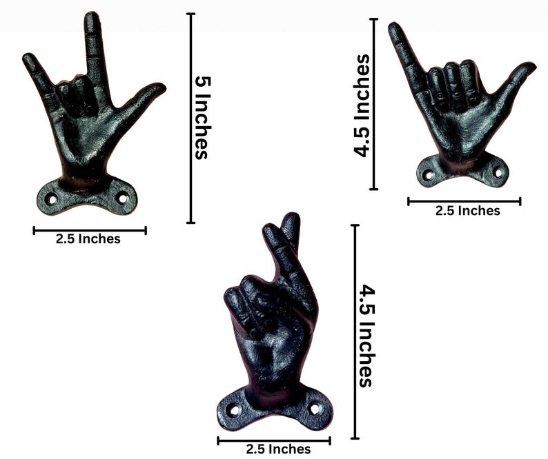 May include: Set of three black cast iron hand-shaped wall hooks. The hooks are in the shape of hand gestures, including "I love you", "hang loose", and crossed fingers. Each hook is approximately 2.5 inches wide and between 4.5 and 5 inches tall.