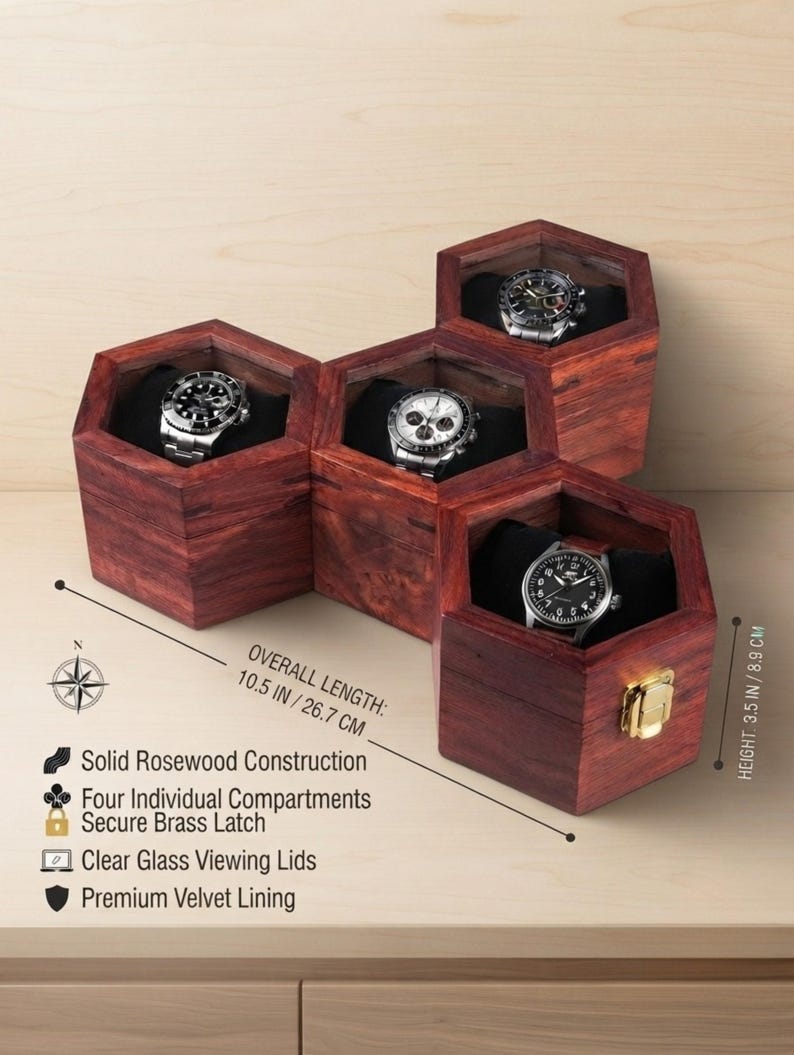 May include: A hexagonal rosewood watch box with four individual compartments, clear glass lids, and a brass latch. The box measures 10.5 inches in length and 3.5 inches in height. Each compartment contains a watch resting on black velvet lining.