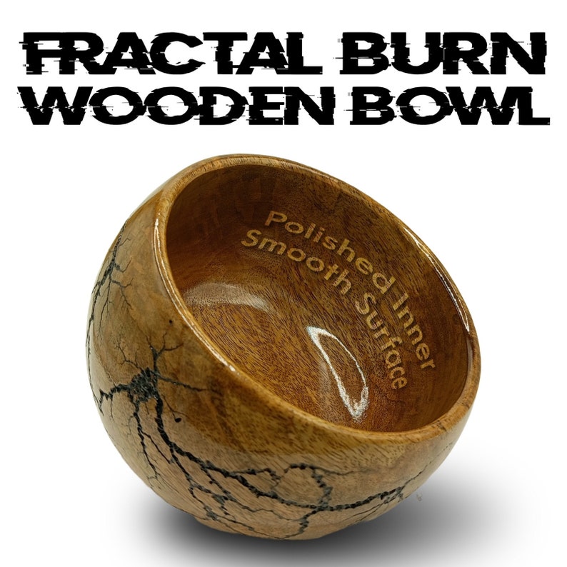 May include: A wooden bowl with a fractal burn design. The inside of the bowl is polished smooth. The bowl is made of wood and has a natural brown color.