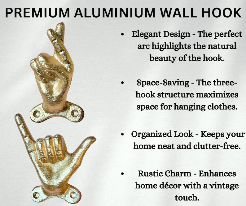 May include: Gold-colored aluminum wall hooks shaped like hands, one with fingers crossed and the other with a shaka sign. The hooks are mounted on a white background and are labeled "PREMIUM ALUMINIUM WALL HOOK".