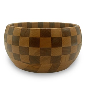 May include: A wooden bowl with a checkered pattern in shades of brown. The bowl is round and has a smooth, polished finish.