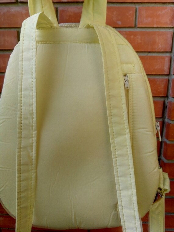 yellow designer backpack