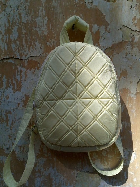 yellow designer backpack