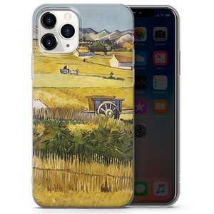 May include: A clear phone case with a painting of a rural landscape. The painting features a field of wheat, a wooden fence, a wagon, and a farmhouse in the distance. The colors are warm and earthy, with shades of yellow, brown, and green.