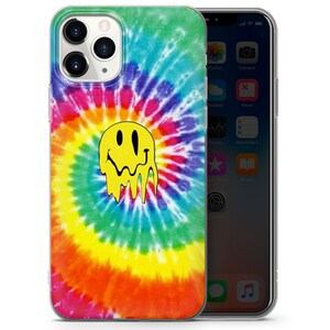 May include: A clear phone case with a tie-dye pattern in shades of blue, green, yellow, orange, and red. A yellow smiley face with dripping black lines is centered on the case.