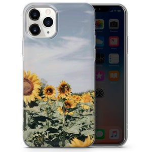 May include: A clear phone case with a sunflower field printed on the back. The case is designed for an iPhone.