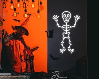 May include: A white neon sign shaped like a skeleton with a skull, hanging on a black wall. The sign is lit up and glowing. The text "By ZP2 Neon Custom" is visible in the bottom right corner of the image.