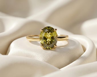 Oval Peridot Solitaire Ring in Yellow Gold Plated Sterling Silver
