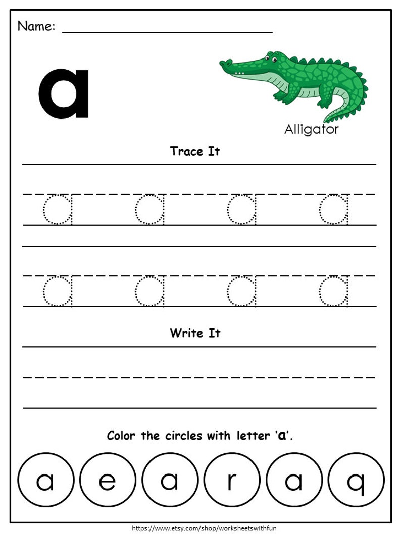 May include: A black and white printable worksheet for learning the letter 'a'. The worksheet features a cartoon alligator and asks the user to trace and write the letter 'a' and color circles containing the letter 'a'.