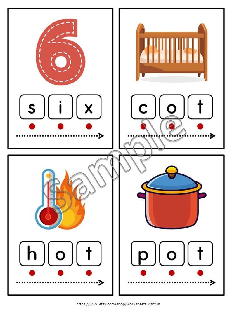 May include: Educational flashcards featuring colorful illustrations and word formations. Includes a red number 6, a brown crib, a thermometer with flames, and a red pot with a blue lid. Each card has letter blocks spelling out words like "six", "cot", "hot", and "pot".