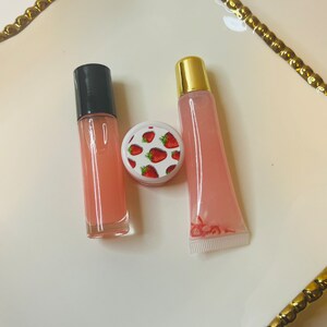 May include: A set of three ceramic mugs with a speckled, matte finish. The mugs are in shades of cream, light gray, and dark gray. Each mug has a simple, modern design and a rounded handle. Perfect for coffee or tea.