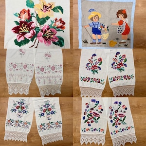 May include: Set of eight embroidered white cotton tea towels with lace trim. The towels feature floral designs in various colors, including red, pink, blue, and yellow. Some towels feature a single bouquet of flowers, while others feature two bouquets.