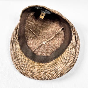Kangol flat cap, tweed flat cap, designer flat cap, vintage flat cap, vintage hat, retro flat cap, retro Kangol flat cap, vintage hat, vintage hats, vintage cap, mens flat cap, mens vintage cap, mens vintage hat, unique style, unique fashion, secondhand fashion, preloved fashion, unique gifts, vintage style, vintage fashion

#KangolVintage #FlatCap #BritishMade #VintageHat #TanCap #VintageFashion #ClassicHat #HeritageStyle #VintageMenswear