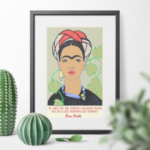 K&ouml;nnte beinhalten: Gerahmter Druck eines Portr&auml;ts von Frida Kahlo mit einem Zitat auf Spanisch: "Al final del d&iacute;a, podemos aguantar mucho m&aacute;s de lo que pensamos que podemos." Frida Kahlo.