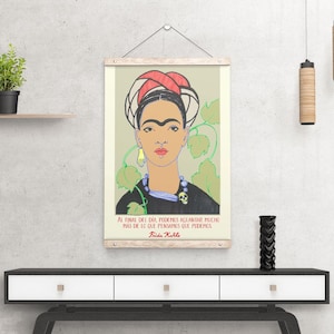 K&ouml;nnte beinhalten: Ein farbenfrohes Poster mit einem Portr&auml;t von Frida Kahlo und einem Zitat auf Spanisch: "Al final del d&iacute;a podemos aguantar mucho m&aacute;s de lo que pensamos que podemos."  Frida Kahlo.