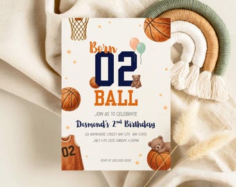 May include: A basketball-themed birthday invitation with the text "Born 02 BALL" in navy and orange. The invitation includes basketballs, a teddy bear, and the details for Desmond's 2nd birthday.