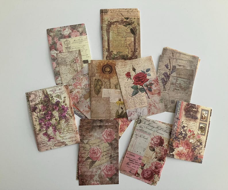 May include: A set of vintage-style paper ephemera featuring floral designs, including roses and other flowers, with a distressed, aged look. The papers are perfect for scrapbooking, card making, and other craft projects.