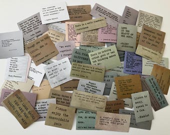 May include: A collection of colorful cards with inspirational quotes printed on them. The quotes are in a typewriter font and cover a variety of topics, including love, life, and happiness. The cards are perfect for adding a touch of inspiration to your home or office.