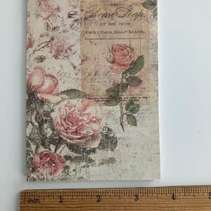May include: A vintage-style illustration of pink roses on a textured background. The text "USE Home Soap. CUT FULL POUND BEST BAR SOAP MADE." is printed on the image.