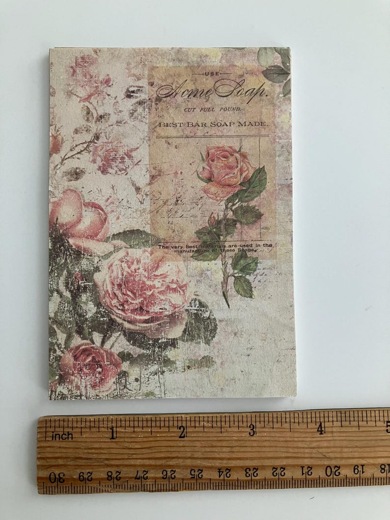 May include: A vintage-style illustration of pink roses on a textured background. The text "USE Home Soap. CUT FULL POUND BEST BAR SOAP MADE." is printed on the image.