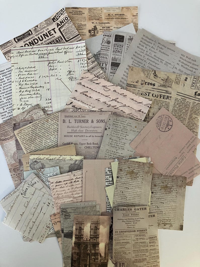 May include: A collection of vintage paper ephemera, including newspaper clippings, handwritten letters, and postcards. The papers are in various shades of brown, beige, and cream, and some have faded ink. The papers are arranged in a random pattern, and some are overlapping. The papers are all different sizes and shapes.