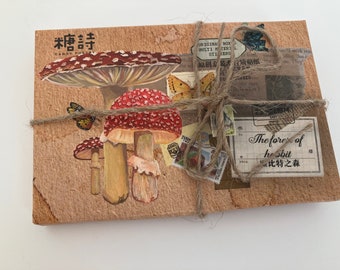 May include: A brown paper package with a string bow. The package is decorated with mushroom illustrations, butterflies, and stamps. The text "糖詩 CANDY POST" is printed on the front of the package. The text "The forest of habit 比特之森" is printed on a label on the package.