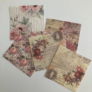 May include: A set of six vintage-style paper squares with floral and letter designs. The papers feature a faded, antique aesthetic with roses, handwritten script, and postage stamps.