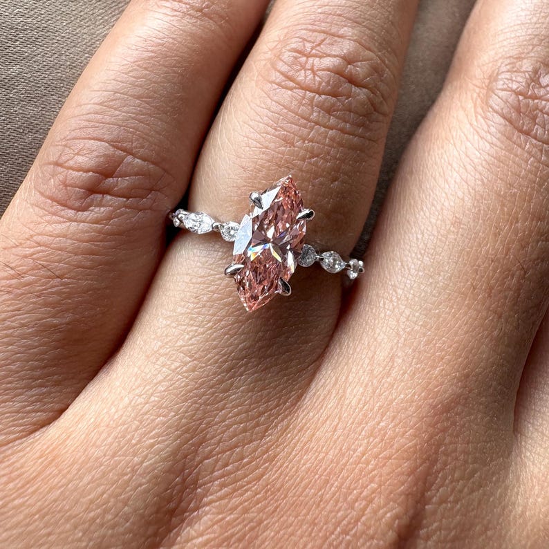 2.40 carat pink marquise lab grown diamond engagement ring with marquise-round diamond band in gold