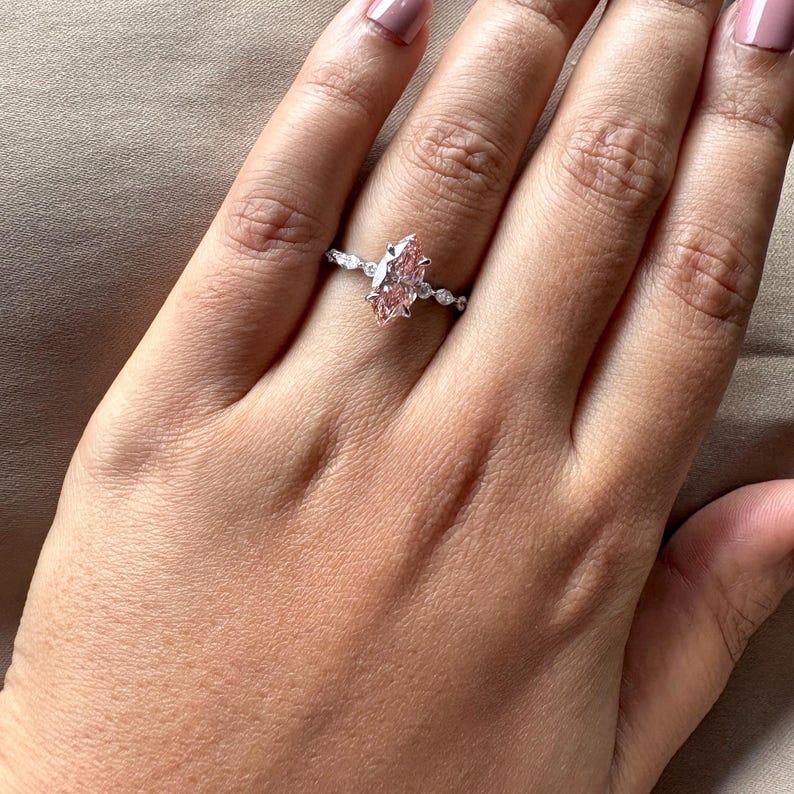 2.40 carat pink marquise lab grown diamond engagement ring with marquise-round diamond band in gold