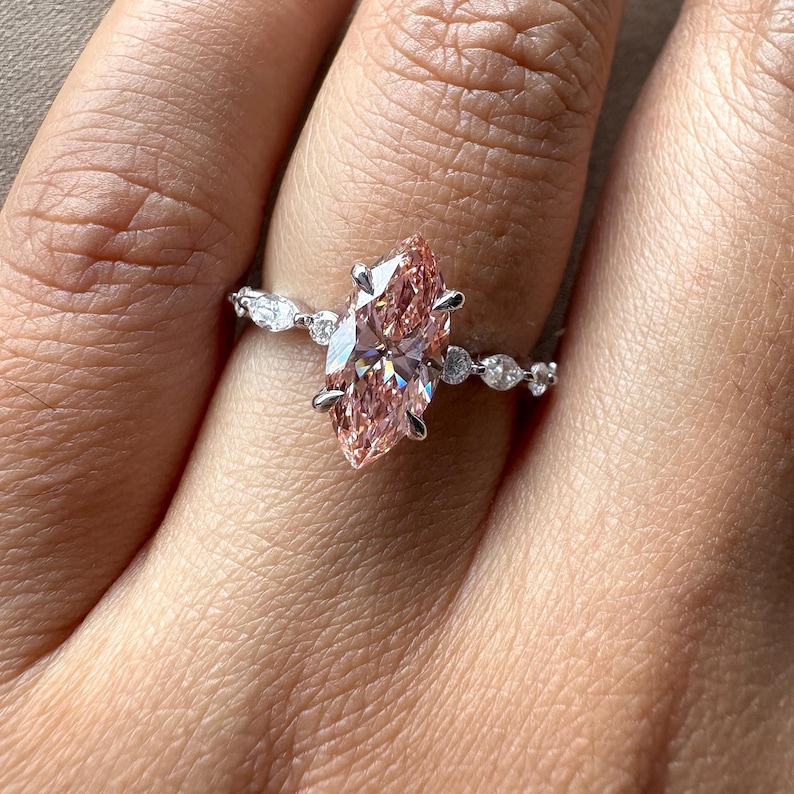 2.40 carat pink marquise lab grown diamond engagement ring with marquise-round diamond band in gold