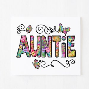 May include: A white card with the word "AUNTIE" in colorful letters with a floral pattern. The word is surrounded by butterflies and swirls.