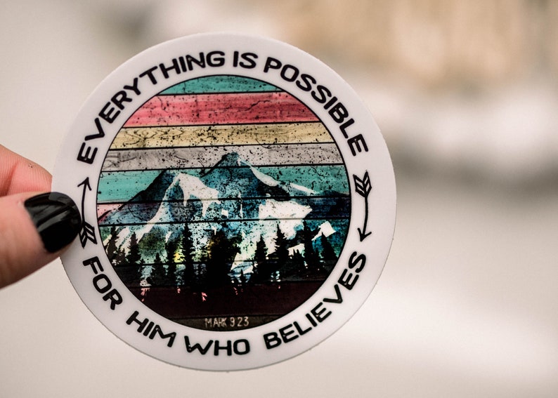 May include: A white round sticker with a colorful mountain scene and the text "Everything is possible for him who believes Mark 9:23".