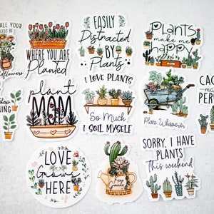 May include: Ten colourful stickers with plant-themed designs and sayings. The stickers feature illustrations of plants, flowers, and cacti, along with phrases like "Plant Mom", "Easily Distracted by Plants", and "Love Grows Here".