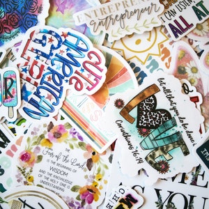 May include: A collection of colourful stickers with various designs and phrases, including "Hello Summer", "Let all that you do be done in love", "Fear of the Lord is the beginning of wisdom", and "Cute as a button".