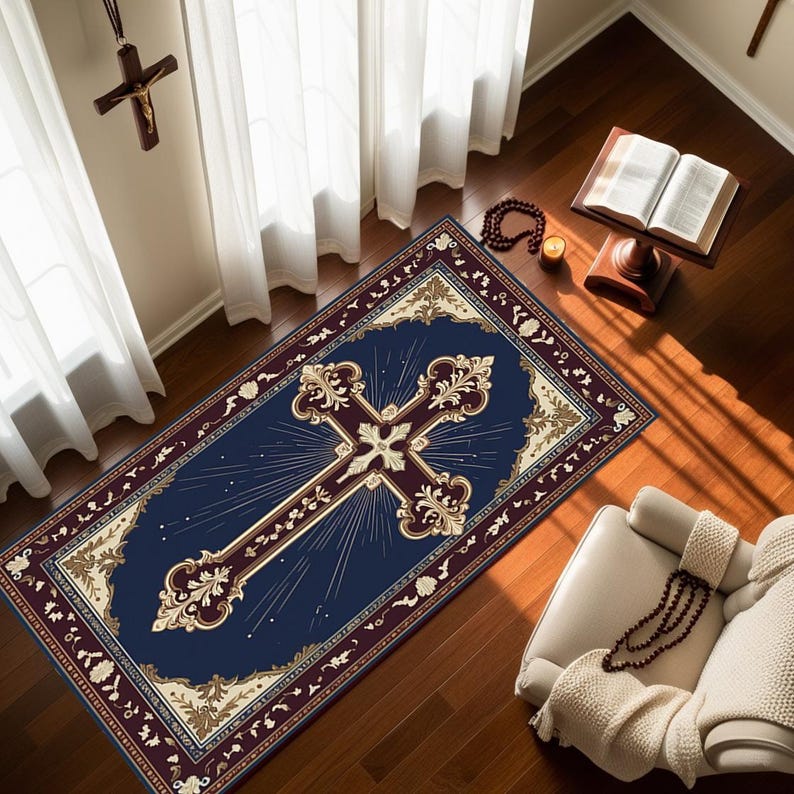 May include: A navy blue rug with a gold and burgundy ornate border. A large gold cross with intricate details is centered on the rug. The cross is surrounded by a radiating pattern of gold lines.