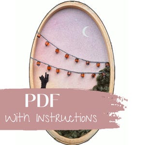 May include: An oval-shaped wooden frame with a felted scene of a night sky with a crescent moon and string lights. A black cat silhouette is in the foreground. The text "PDF with Instructions" is across the bottom.