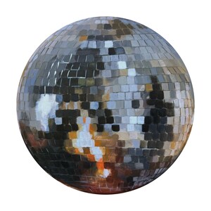 May include: A silver disco ball with mirrored tiles, reflecting light in a variety of colors, including orange, brown, and white.