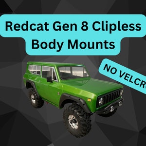 May include: Green model car with black wheels and a black front bumper. The car has a black grill and black side mirrors. The car is on a black background with a blue banner that says "Redcat Gen 8 Clipless Body Mounts NO VELCRO!!"