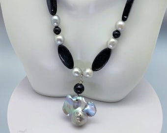 Fresh Water Pearl beads + Lapiz Lazuli beads, and a natural large Mabe Pearl pendant