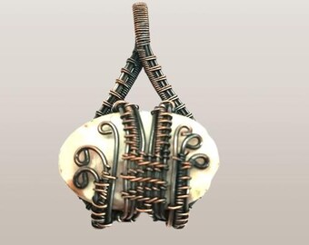 Jasper with Copper handmade wire wrapped frame.