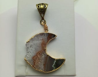 Crescent Shape Quartz Crystal Pendant.