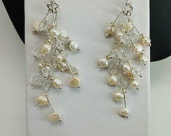 Cascading pearl and  faceted crystal earring
