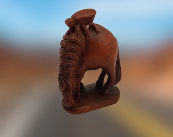 Vintage NETSUKE, Horse and a Bee which is a miniature hand carved wooden sculpture.
