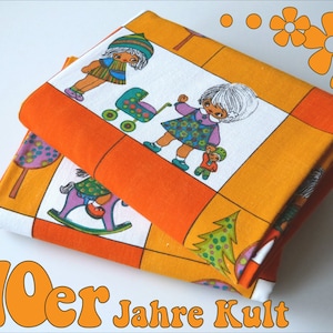 May include: Two pieces of orange and white fabric with a checkered pattern. The fabric features a repeating design of children playing with toys, including a rocking horse, a stroller, and a Christmas tree. The fabric has the text "70er Jahre Kult" printed on it.