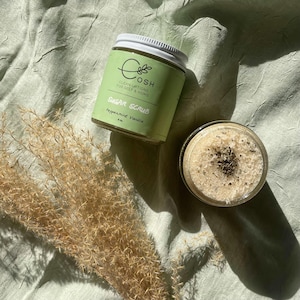 May include: A glass jar of peppermint vanilla sugar scrub with a white lid. The jar is labeled "COSH Clean Options for Self & Home Sugar Scrub Peppermint Vanilla 4 oz."
