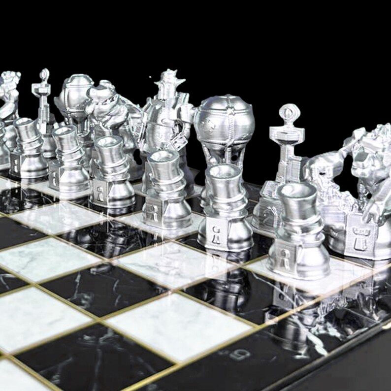 May include: A silver chess set with a black and white marble board. The chess pieces are designed in a futuristic style with intricate details.